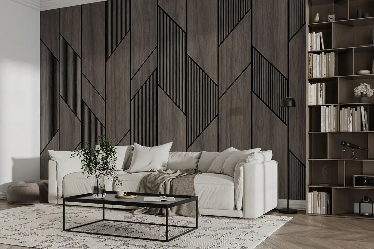 Dark geometric wood wall panels behind a light sofa and built-in shelving.